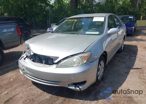 2002 Toyota Camry Le из США, поврежденный, VIN JTDBE32K520115478